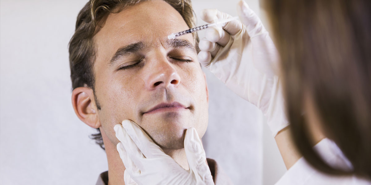 man getting botox dysport jeuveau xeomin injection by dermatologist plastic surgeon medspa