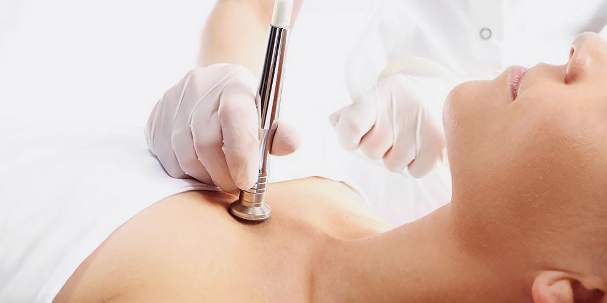 microdermabrasion on woman .skin by dermatologist skin expert