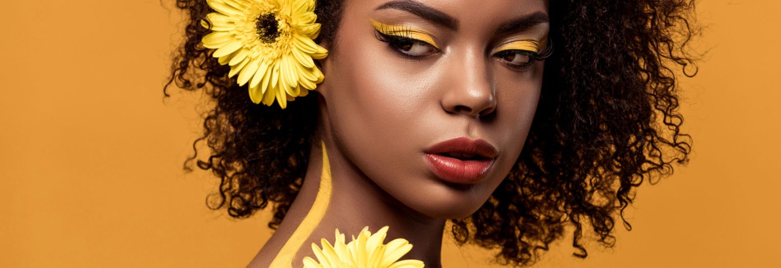 Young bright african american woman with artistic make-up